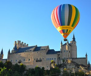 Hot air balloon Madrid flying next to the Alcazar in Segovia